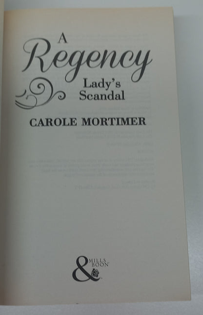 A Regency Lady's Scandal: The Lady Gambles (Copeland Sisters #1) & The Lady Forfeits (Copeland Sisters #2) by Carole Mortimer (2 in 1)