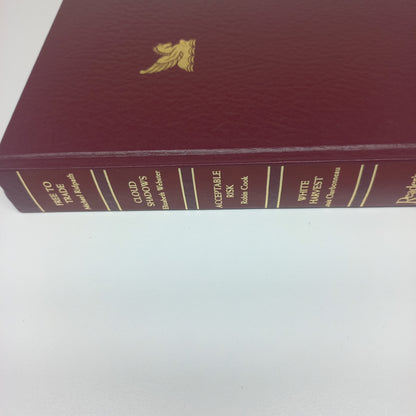 Reader's Digest (4 in 1) Free to Trade by M. Ridpath, Cloud Shadows by E. Webster, Acceptable Risk by R. Cook & White Harvest by L. Charbonneau